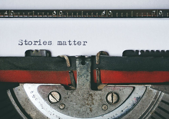 Close up of an old typewriter with the typed words 'stories matter'