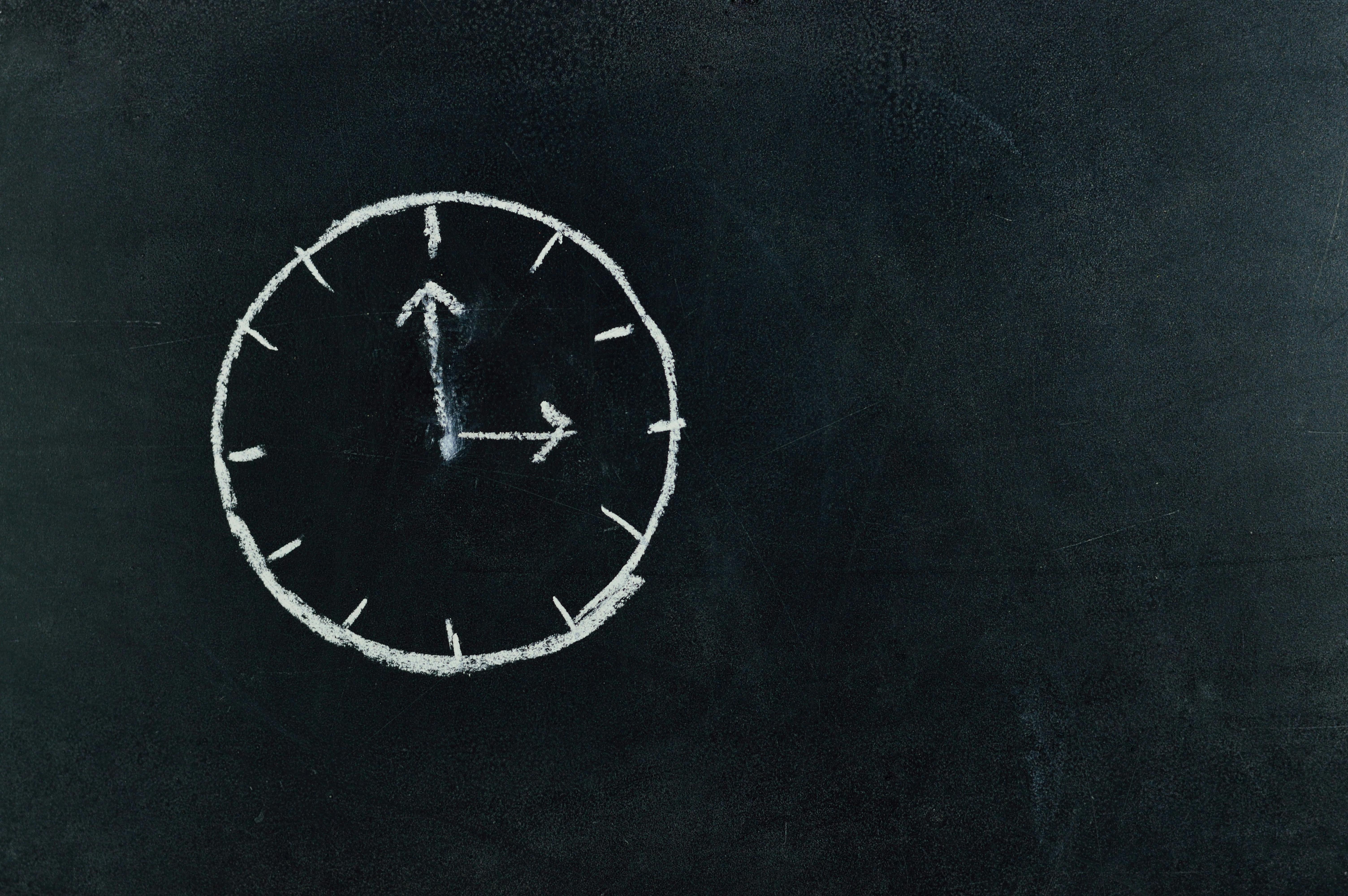 A chalkboard drawn clock