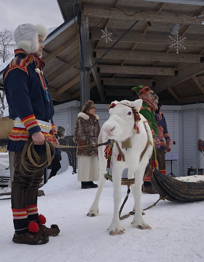 Reindeer herders in traditional attire at the Jokkmokk Market, one of the most important Sámi events of the year. There are around a thousand professional reindeer herders in Sweden, who manage their own reindeer and those of family members, following the herd as it moves from the east to west and back again with the change of the season.