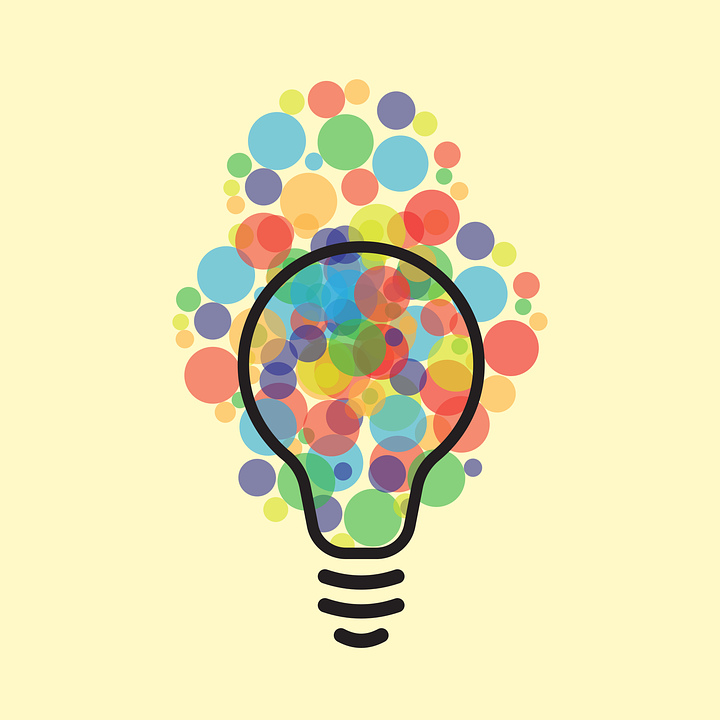 Graphic illustration of a lightbulb with coloured circles behind it