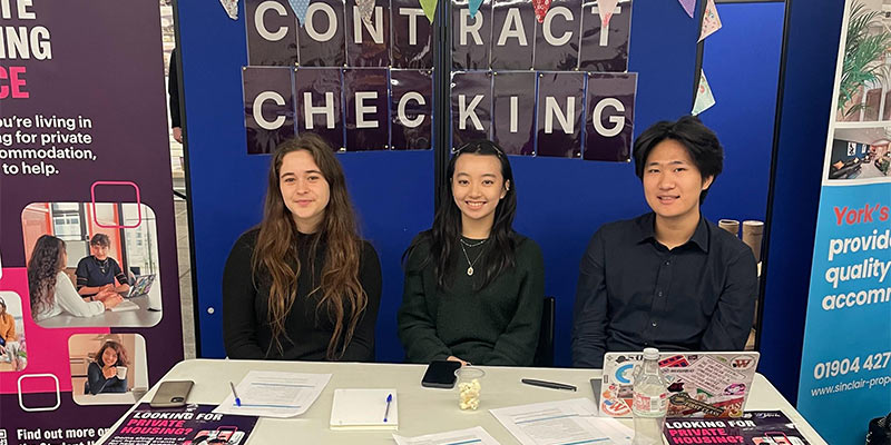 A team of student contract checkers ready to offer advice at a housing fair.