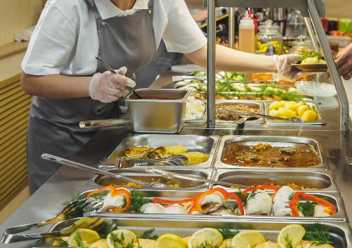 Serving food at school canteen