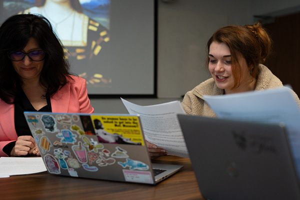 A student and a lecturer in a seminar