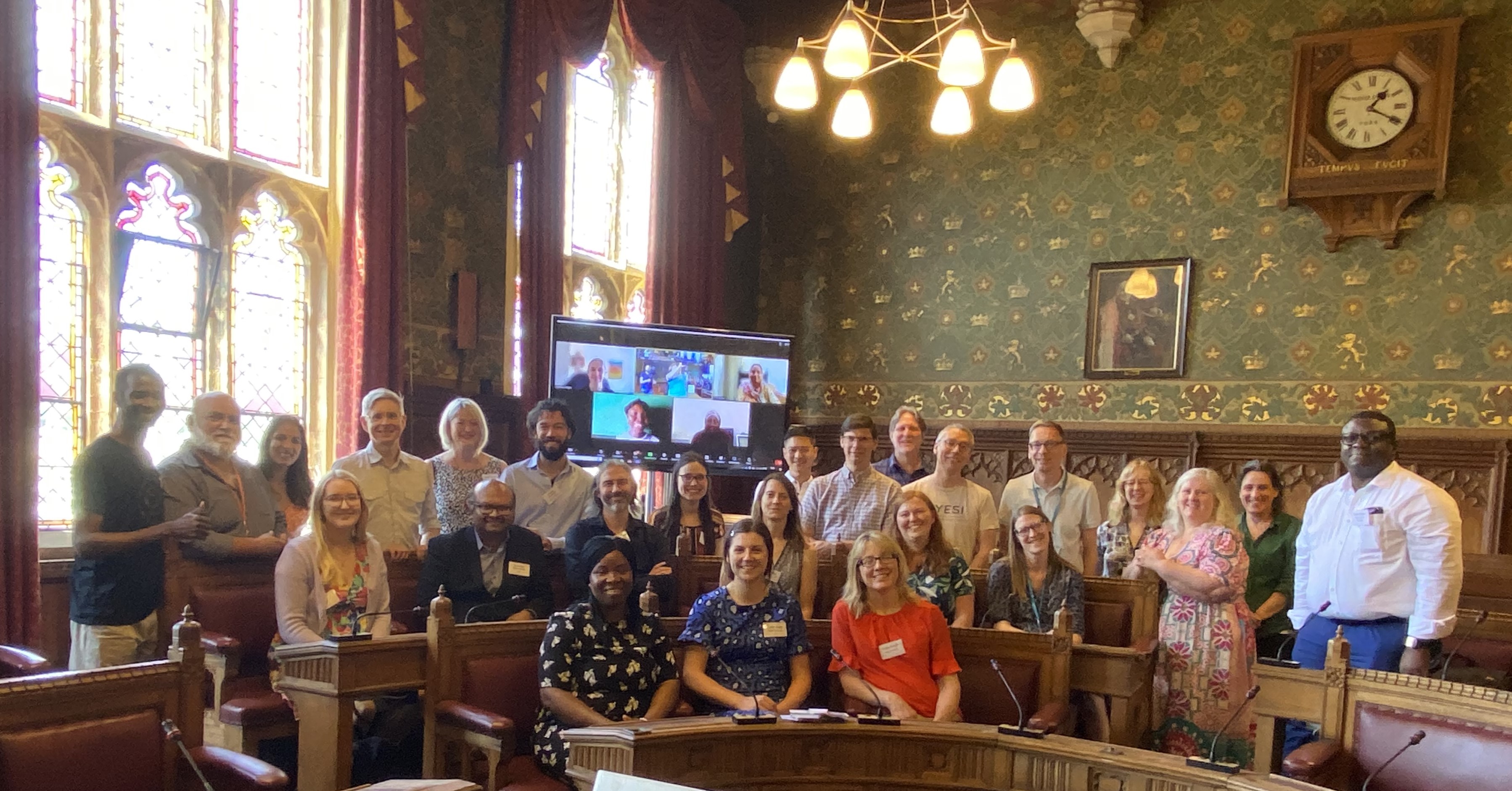 Group photo of the Dragons' Den attendees taken in The Guildhall Council Chamber