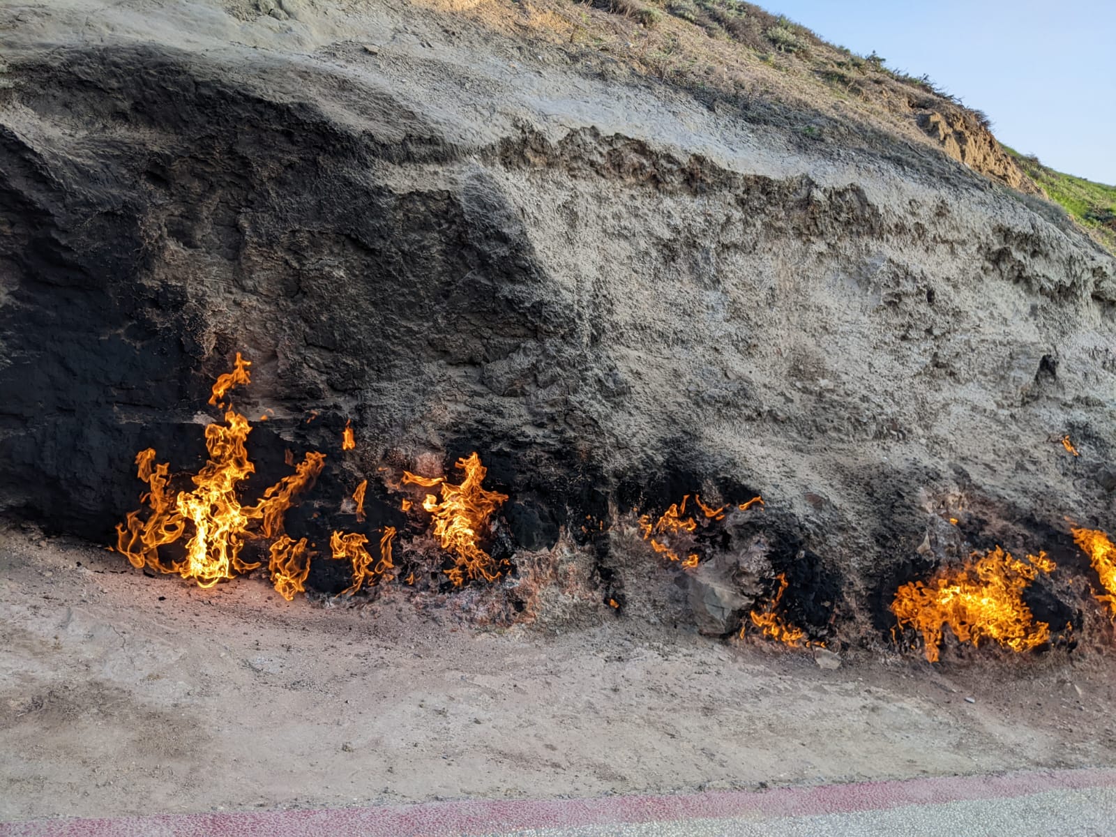 Burning hillside a Yanar Dag where the gas fields are alight