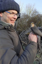 Dr Colin Beale holding a bird